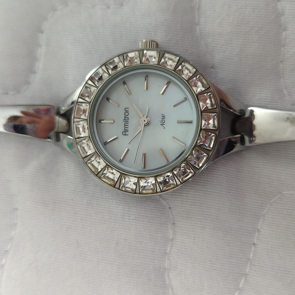 REDUCED TO SELL!!GORGEOUS Armitron bangle watch with Swarovski crystal dial.